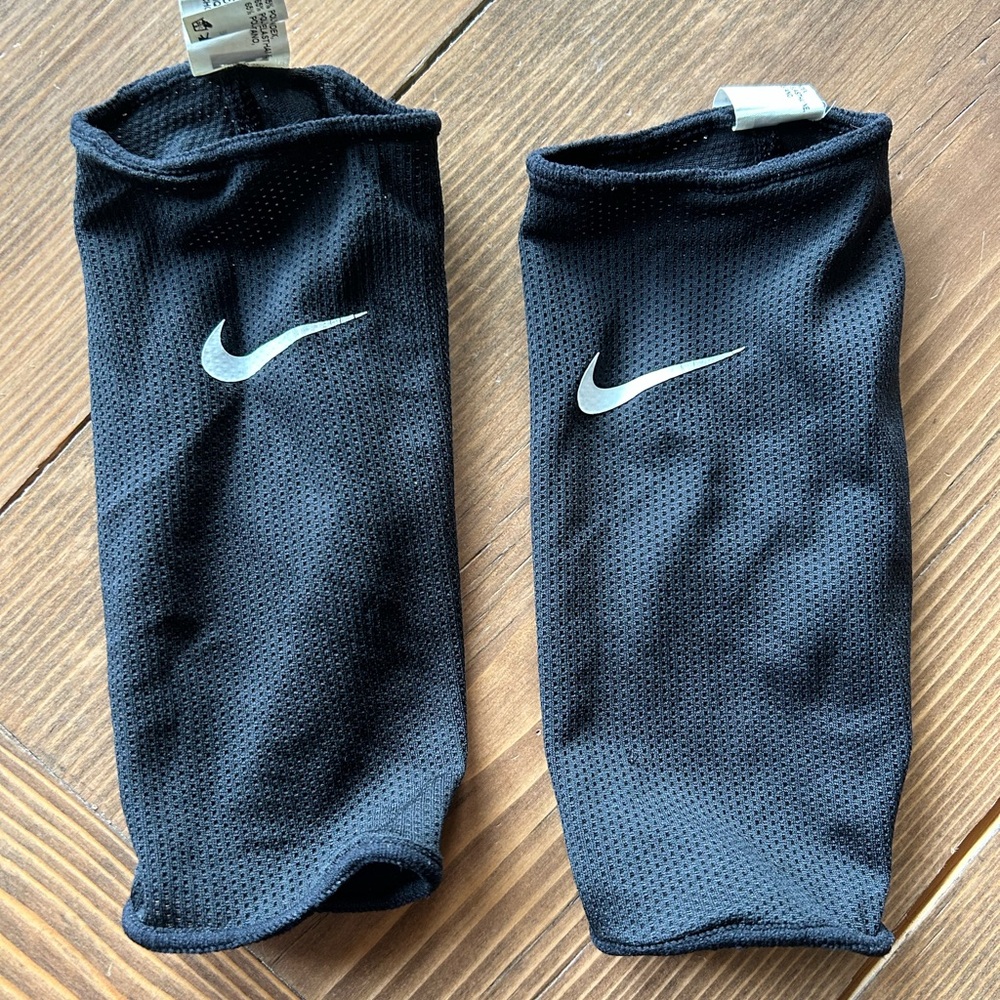 Nike Black Shin Guard Covers with White Swoosh Medium